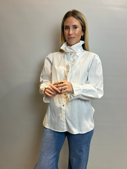 Camisa blanca volante